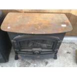 A CAST IRON LOG BURNER (GLASS A/F)