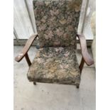 A PARKER KNOLL MAHOGANY ARMCHAIR - MODEL PK 728