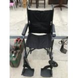 AN AS NEW FOLDING WHEELCHAIR