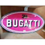 AN OVAL BUGATTI WALL SIGN