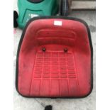 A RED TRACTOR SEAT