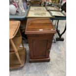 A MAHOGANY SINGLE DOOR CUPBOARD