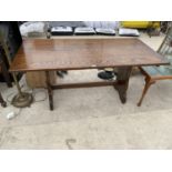 A RECTANGULAR OAK REFECTORY DINING TABLE WITH PEGGED LOWER STRETCHER RAIL