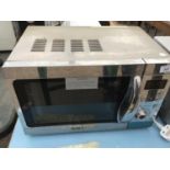 A PRESTIGE STAINLESS STEEL MICROWAVE IN WORKING ORDER