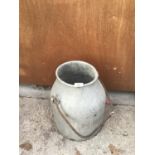 A GALVANISED MILKING BUCKET