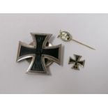 THREE GERMAN ITEMS - IRON CROSS SCREW BACK MEDAL, MINIATURE MEDAL AND STICK PIN