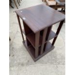 A CANTERBURY STYLE MAHOGANY BOOKCASE ON CASTERS