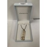 A BOXED SILVER INGOT PENDANT AND CHAIN