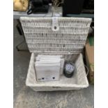 A WICKER BASKET COTTON LINENS ETC