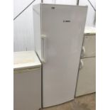 A TALL UPRIGHT BOSCH FRIDGE IN VERY CLEAN AND WORKING ORDER
