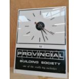 AN ILLUMINTAED PROVINCIAL BUILDING SOCIETY CLOCK