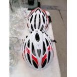 TWO BIKE HELMETS