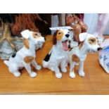 A COLLECTION OF THREE ROYAL DOULTON CERAMIC DOGS