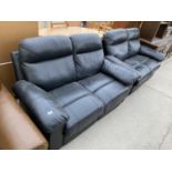 TWO BLACK LEATHER TWO SEATER SOFAS