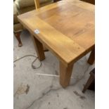 A SQUARE OAK COFFEE TABLE