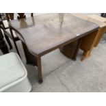 A MAHOGANY DRAW LEAF DINING TABLE