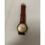 A GENTS ANDREW 17 JEWELS CALENDAR WRIST WATCH