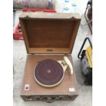 AN ELECTRONIC EQUIPMENT RECORD TURNTABLE DECK IN A WOODEN CASE