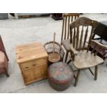 A PINE BEDSIDE CHEST WITH ONE DOOR AND ONE DRAWER, A LEATHER PATCHWORK STOOL A WICKER CHAIR AND