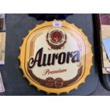 A 'AURORA' VINTAGE STYLE METAL BOTTLE CAP SIGN