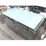 A LARGE METAL CARGO CHEST WITH SIDE HANDLES