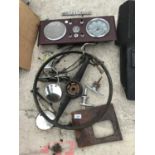 VARIOUS CAR PARTS TO INCLUDE A MORRIS BADGE, STEERING WHEEL, AA BADGE, SPEEDO FACIA ETC