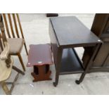 A MAHOGANY MAGAZINE RACK AND AN OAK TEA TROLLEY