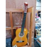 A VINTAGE ACOUSTIC GUITAR