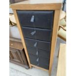 AN OAK CABINET WITH SIX LEATHER FRONTED DRAWERS