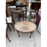 THREE ITEMS - A SMALL MAHOGANY COFFEE TABLE ON CABRIOLE SUPPORTS, A MAHOGANY CORNER TABLE/ PLANT