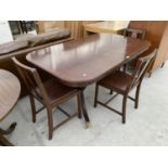 AN INLAID MAHOGANY EXTENDING DINING TABLE ON BRASS LION'S PAW FEET WITH THREE DINING CHAIRS