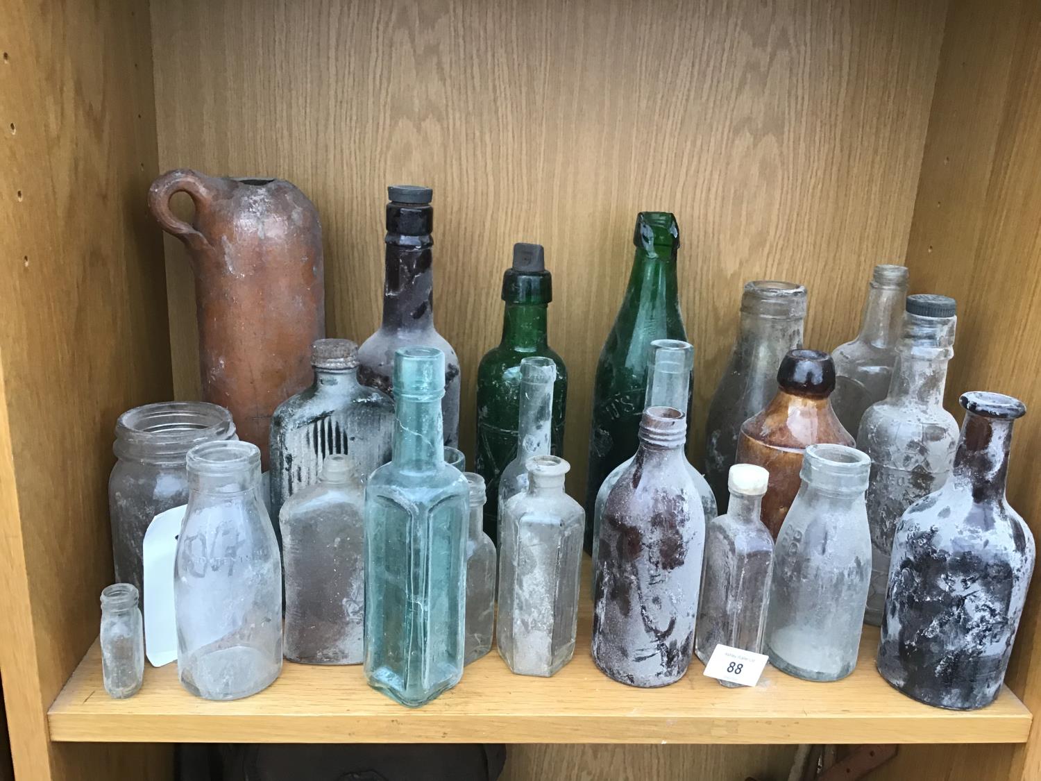 A COLLECTION OF VINTAGE BOTTLES