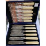 A BOXED SET OF HALLMARKED SILVER HANDLED KNIVES AND FORKS