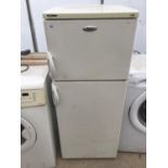 A WHIRLPOOL FRIDGE FREEZER IN FAIRLY CLEAN AND WORKING ORDER