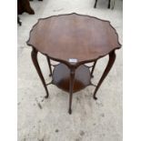 A MAHOGANY OCCASIONAL TABLE WITH PIE CRUST EDGE AND LOWER SHELF