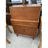 A TEAK BUREAU WITH FALL FRONT, TWO SLIDING DOORS AND ONE DRAWER