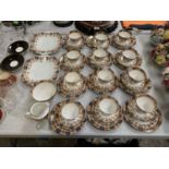 A SANDON EDWARDIAN BONE CHINA TEA SET COMPRISING TWELVE CUPS, SAUCERS AND SIDE PLATES, TWO FURTHER