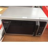 A SHARP MICROWAVE IN CLEAN AND WORKING CONDITION