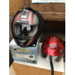 TWO MOTORCYCLE HELMETS A RAYVEN AND AN AS NEW AND BOXED NITRO N760VX SMALL