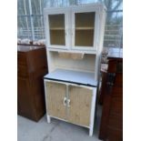 A VINTAGE KITCHEN CABINET WITH TWO LOWER DOORS, TWO UPPER DOORS AND ENAMEL WORK SURFACE