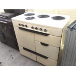 A RETRO ELECTRIC COOKER WITH FOUR RINGS AND VARIOUS OVENS/WARMING DRAWERS