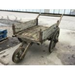 A VINTAGE INDIAN WOODEN THREE WHEELED CART