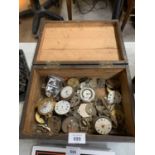 A BOX OF ASSORTED CLOCK AND WATCH PARTS, SILVER POCKET WATCH CASE BACK ETC