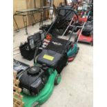 TWO LAWN MOWERS ONE A PETROL POWERBASE AND A BOSCH ELECTRIC IN WORKING ORDER