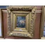 A GILT FRAMED DECORATIVE PRINT