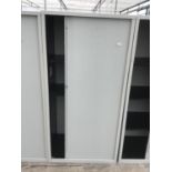 A METAL STORAGE CABINET WITH SLIDING DOOR AND INNER SHELVING
