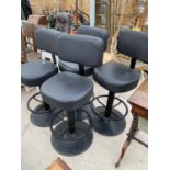 FOUR BLACK LEATHERETTE HIGH STOOLS