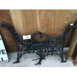 A PAIR OF ORNATE CAST IRON BENCH ENDS