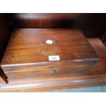 A VINTAGE OAK WRITING BOX WITH INNER FELT WRITING SURFACE, WITH KEY