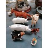 A MIXED LOT OF BESWICK ANIMALS, FOX, TWO PIGS, DOE ETC